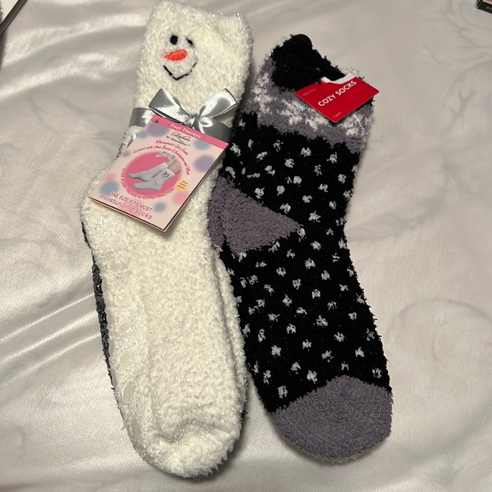 New with tags - 2 sets of 2 each - fluffy socks